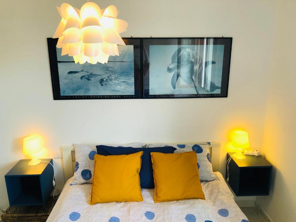 A bed or beds in a room at Appartamento a Corte Balai