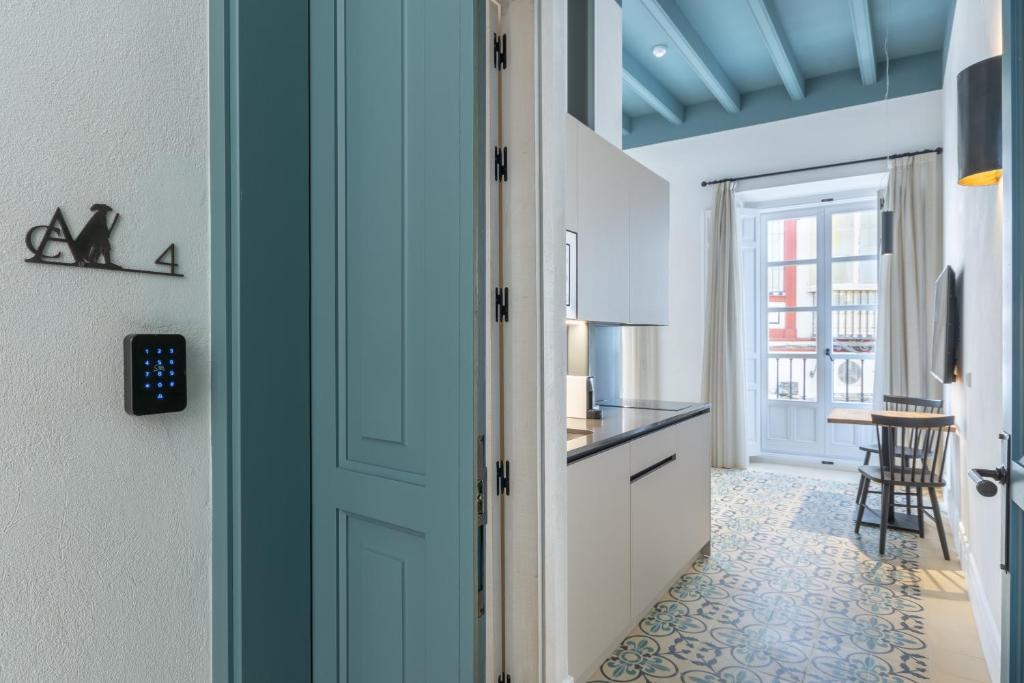 Kuchyňa alebo kuchynka v ubytovaní Apartamentos Caminante del Agua