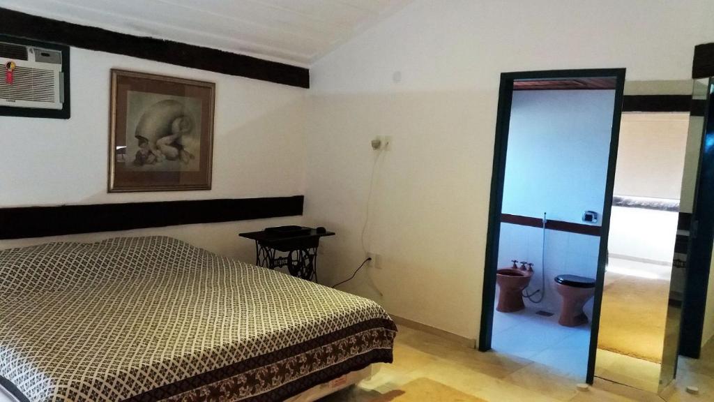  Ótima casa em condomínio fechado a poucos passos da praia