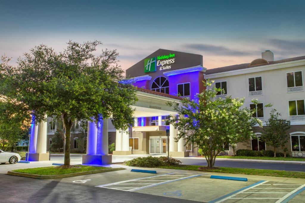 a rendering of a hotel with purple lighting at Holiday Inn Express Silver Springs - Ocala, an IHG Hotel in Silver Springs