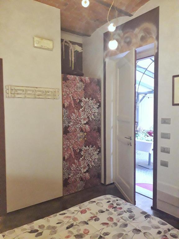 Łóżko lub łóżka w pokoju w obiekcie Cortiletto d'Alba camere con ristorante