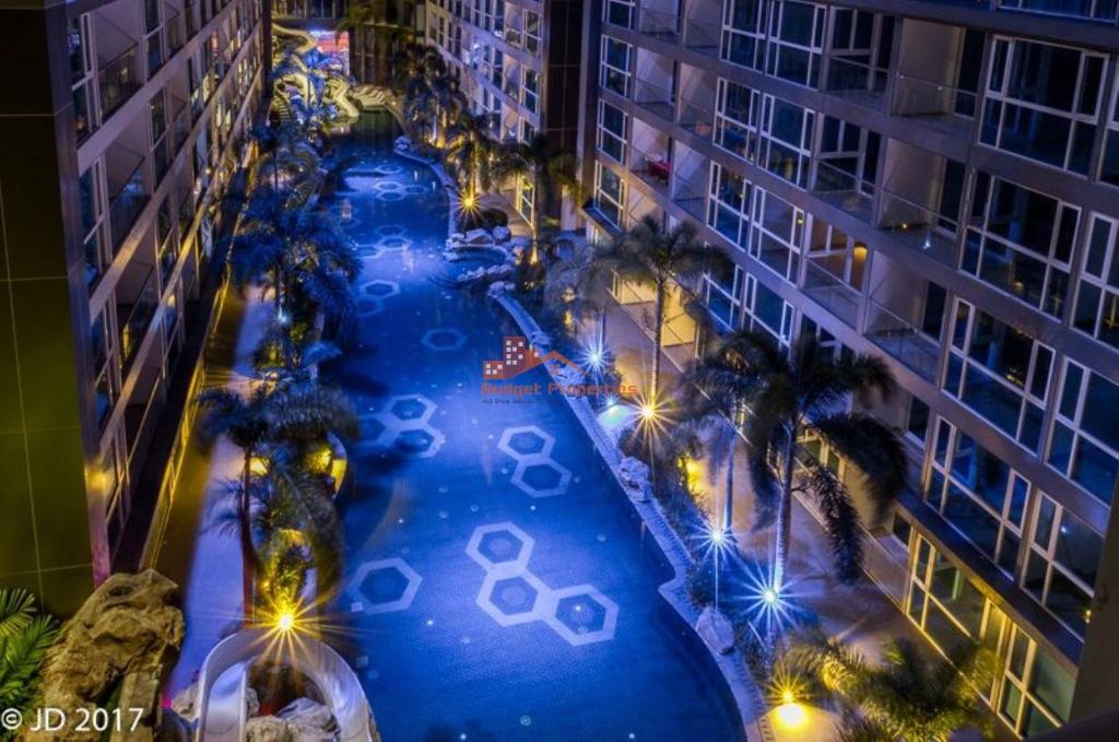 an overhead view of a swimming pool at a resort at night at Centara Avenue a4,Near WALKING STREET,freePOOL,GYM in Pattaya