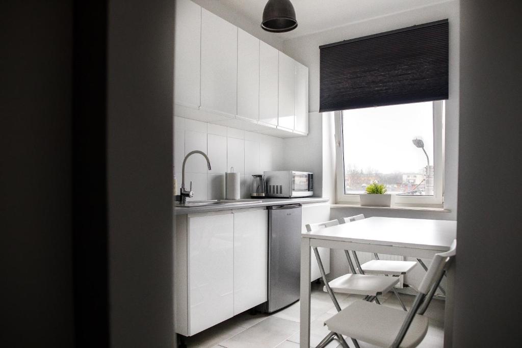 Kuchyňa alebo kuchynka v ubytovaní Apartament Nadbystrzycka no.14