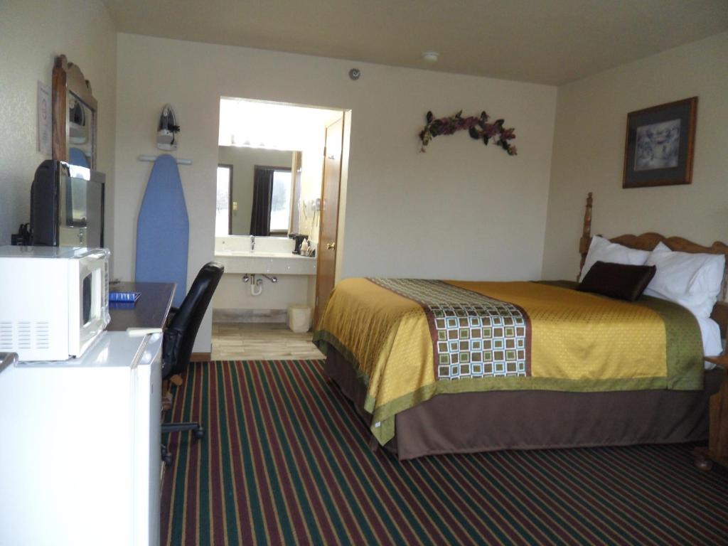 Postel nebo postele na pokoji v ubytování Der Ruhe Blatz Motel