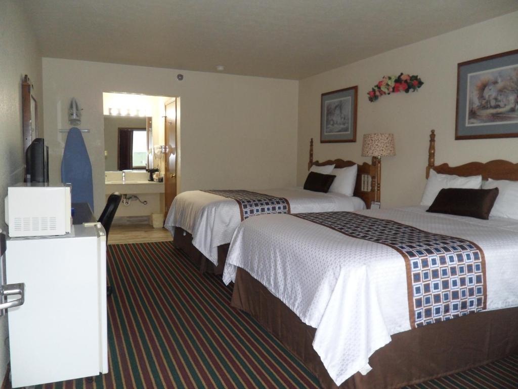 Postel nebo postele na pokoji v ubytování Der Ruhe Blatz Motel