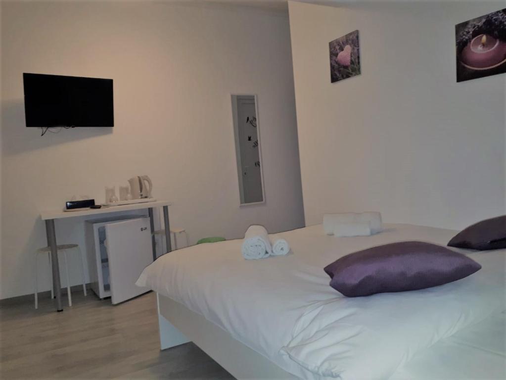 Postel nebo postele na pokoji v ubytování Top Style Villa