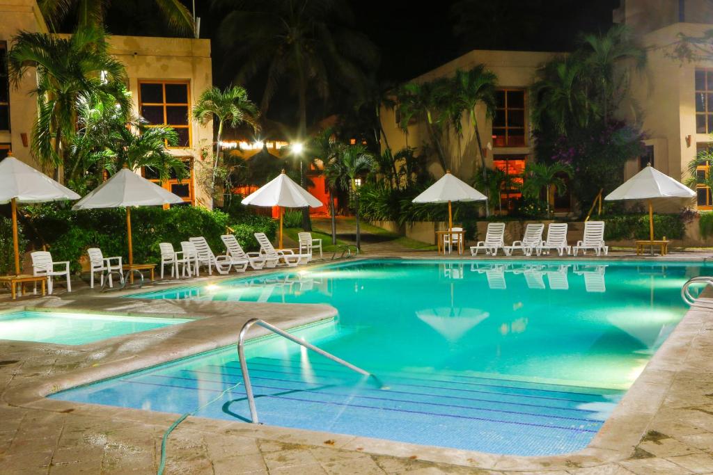 Piscina di Villas El Rancho Green Resort o nelle vicinanze