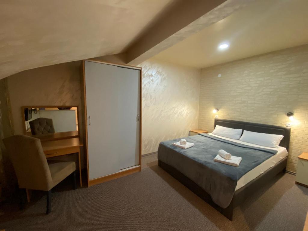 Postel nebo postele na pokoji v ubytování Hotel Moment