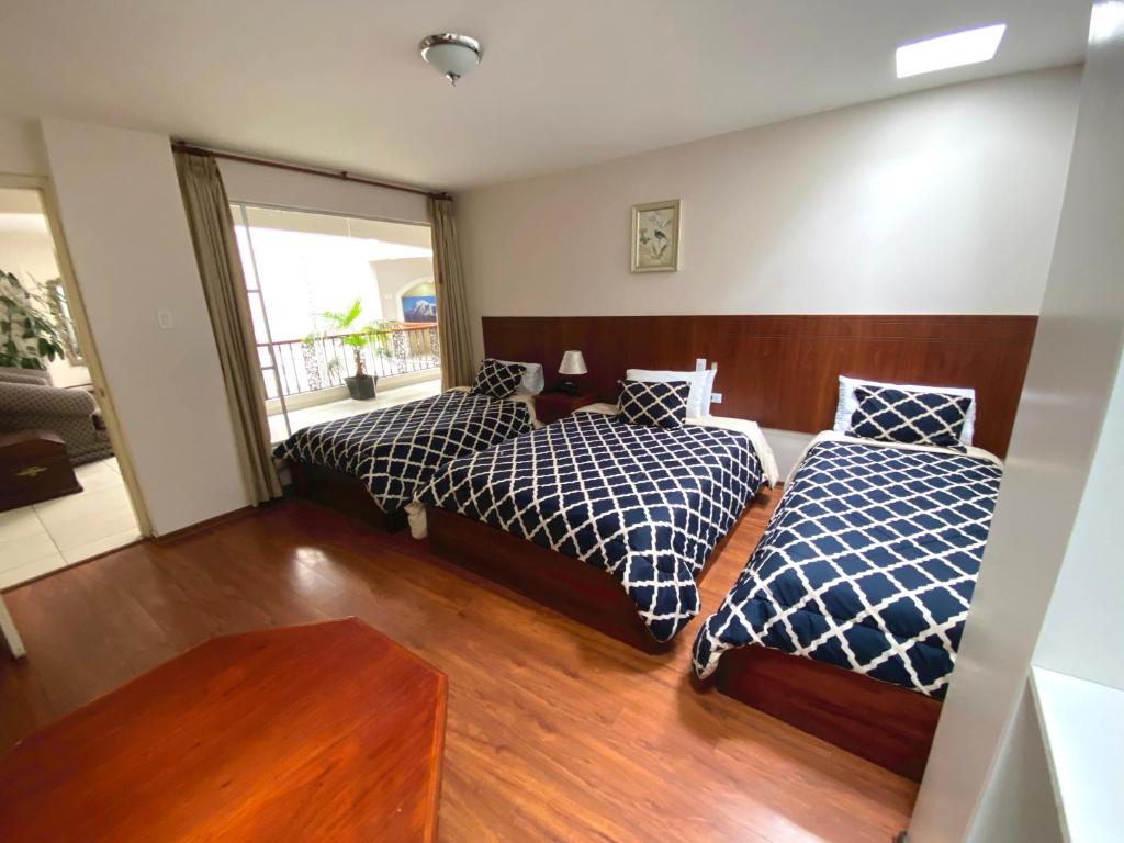 Postel nebo postele na pokoji v ubytování Rio Hotel