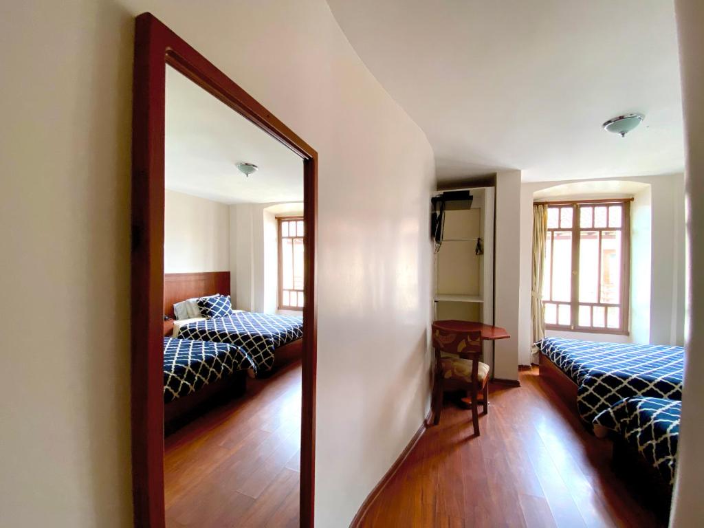 Postel nebo postele na pokoji v ubytování Rio Hotel