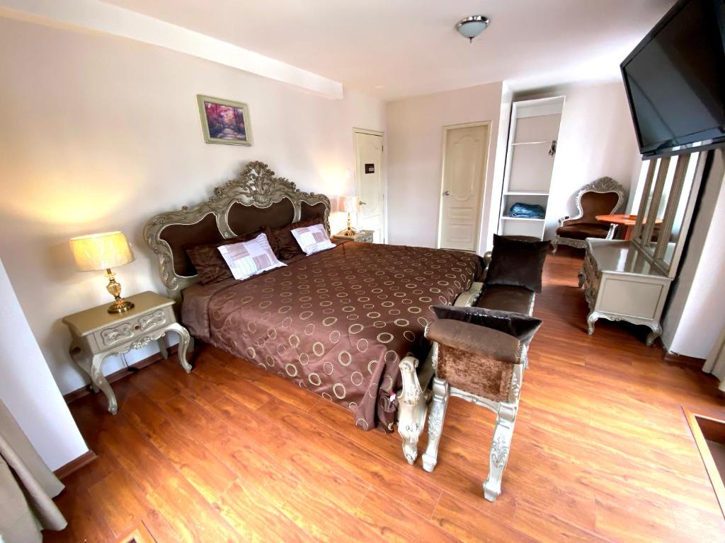 Postel nebo postele na pokoji v ubytování Rio Hotel