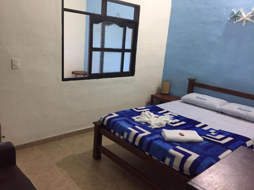 Postel nebo postele na pokoji v ubytování Desiderata Resort