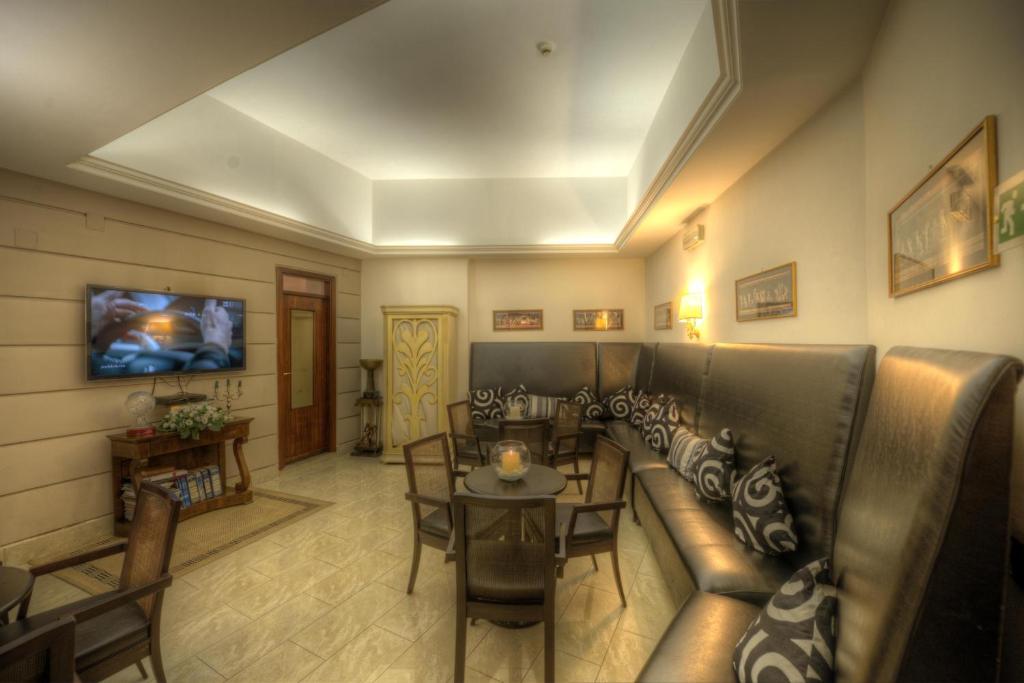 TV a/nebo společenská místnost v ubytování Hotel Palma