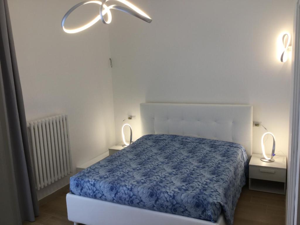 Postel nebo postele na pokoji v ubytování B&B Home Sweet Home - Affitti Brevi Italia