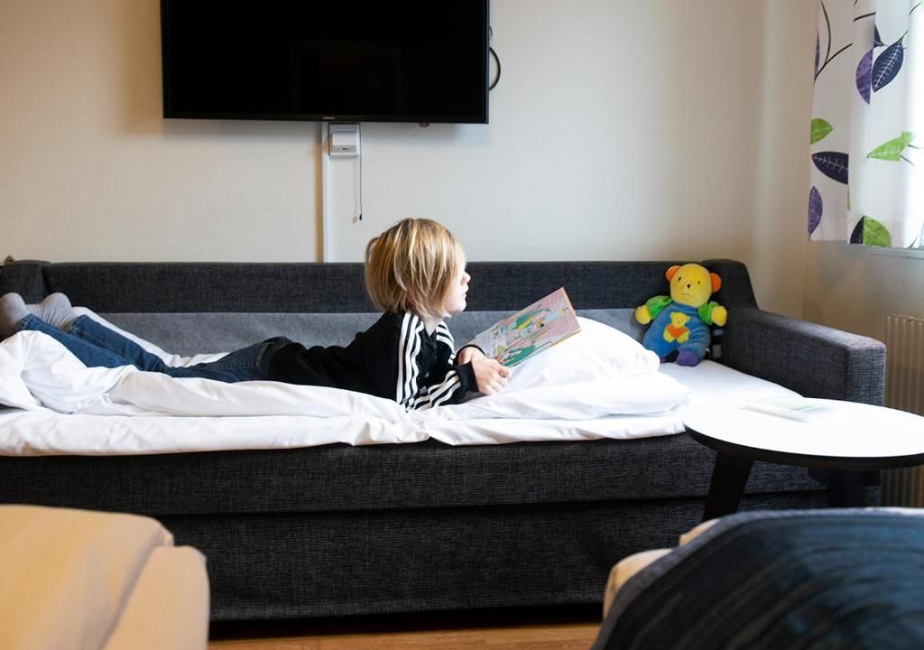 TV a/nebo společenská místnost v ubytování Linköpings Cityhotell och Vandrarhem
