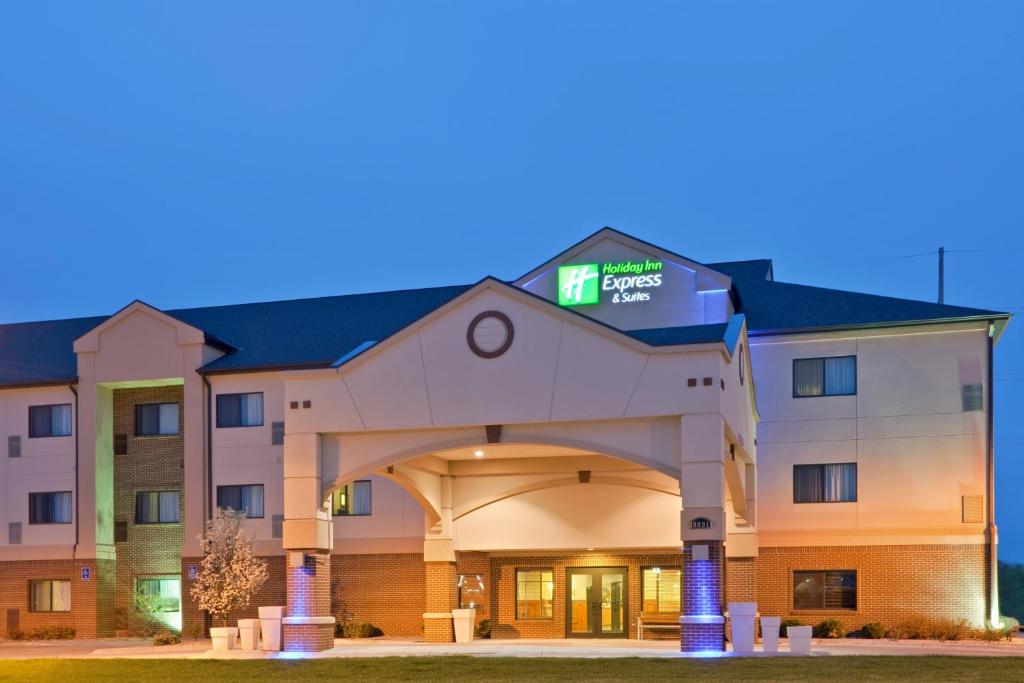 a hotel with a sign on top of it at Holiday Inn Express Hotel & Suites Lincoln South by IHG in Lincoln