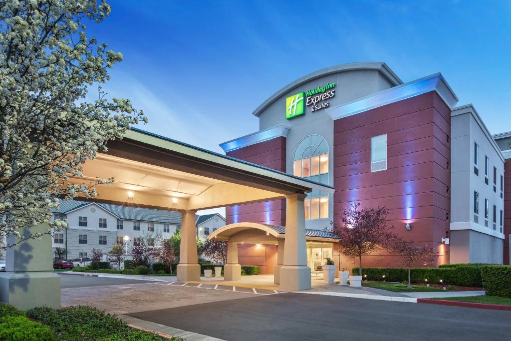 a rendering of a hotel with a gas station at Holiday Inn Express Hotel & Suites Sacramento Airport Natomas by IHG in Sacramento