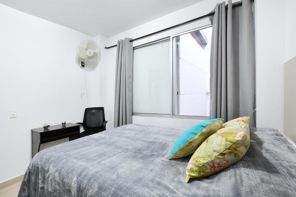 Postel nebo postele na pokoji v ubytování International House Co-Living