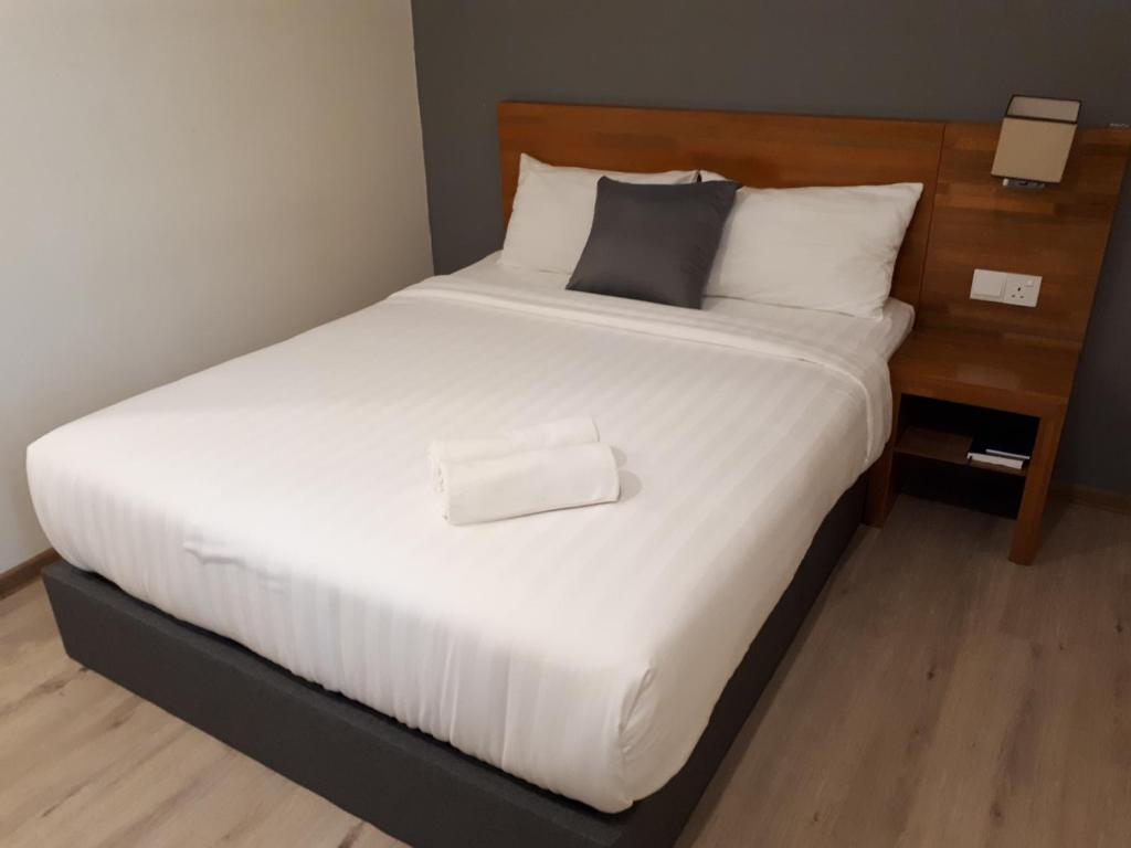 Postel nebo postele na pokoji v ubytování Hotin Inn