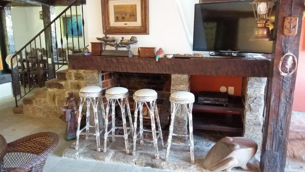  Ótima casa em condomínio fechado a poucos passos da praia
