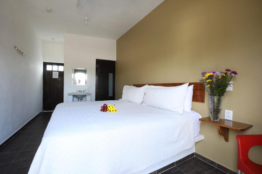 Postel nebo postele na pokoji v ubytování Hotel Del Mar