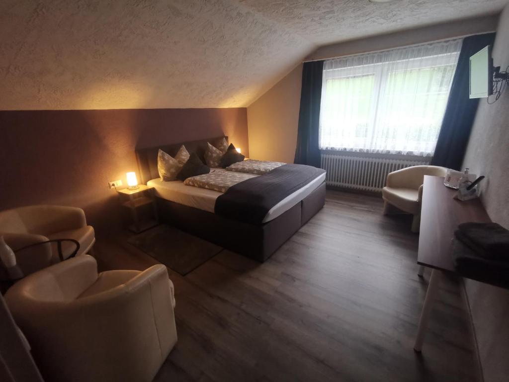 Postel nebo postele na pokoji v ubytování Hennetaler Hof