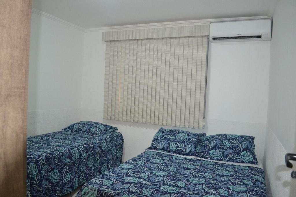  Casa com garagem e churrasqueira a 5 minutos da Praia Grande