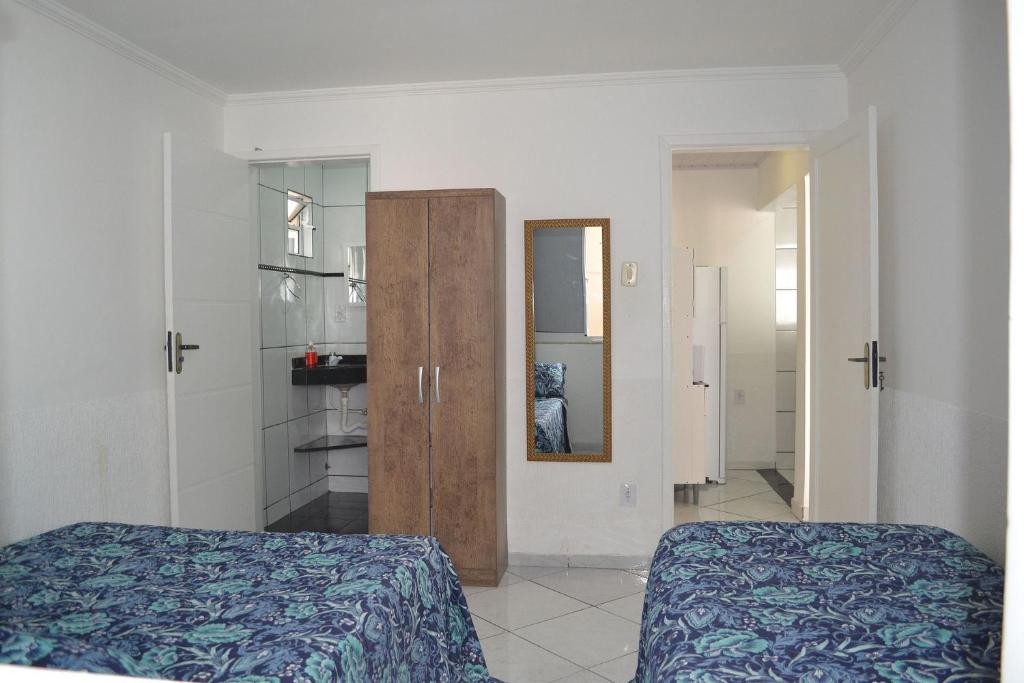  Casa com garagem e churrasqueira a 5 minutos da Praia Grande