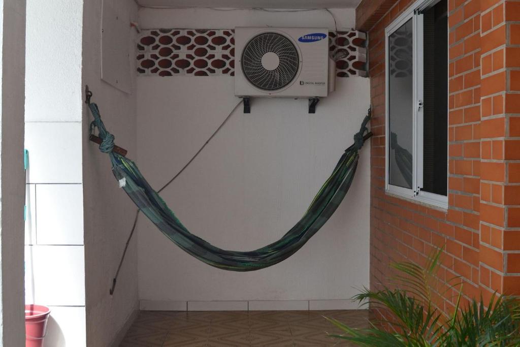  Casa com garagem e churrasqueira a 5 minutos da Praia Grande