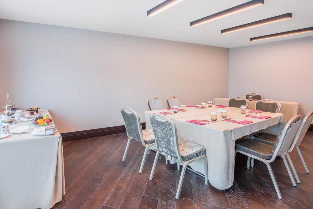 a conference room with a table and chairs in it at Crowne Plaza Istanbul Oryapark by IHG in Istanbul