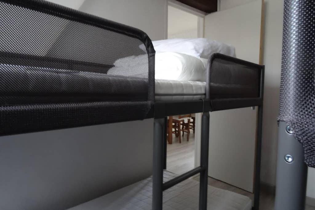 Palanda nebo palandy na pokoji v ubytování Vue mer exceptionnelle dans bourg authentique