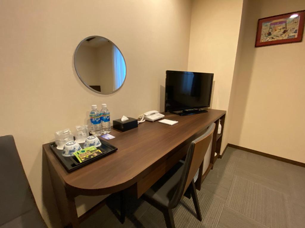 TV a/nebo společenská místnost v ubytování HOTEL SOSHA