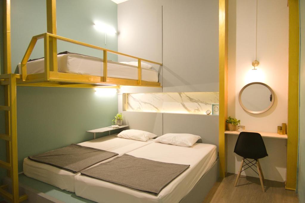 Postel nebo postele na pokoji v ubytování Hugger Hostel