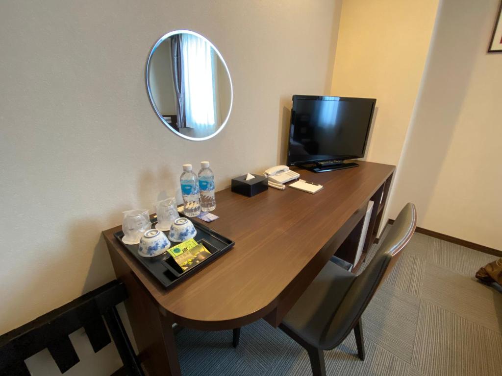 TV a/nebo společenská místnost v ubytování HOTEL SOSHA