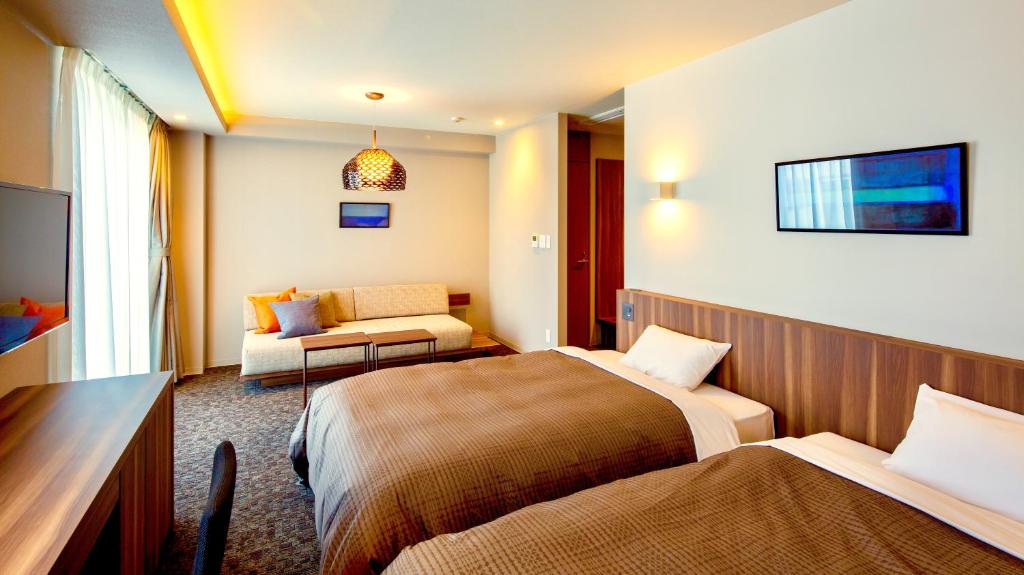 Postel nebo postele na pokoji v ubytování HOTEL SOSHA