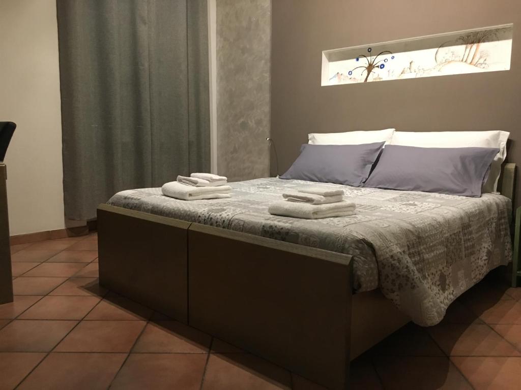 Postel nebo postele na pokoji v ubytování La Corte