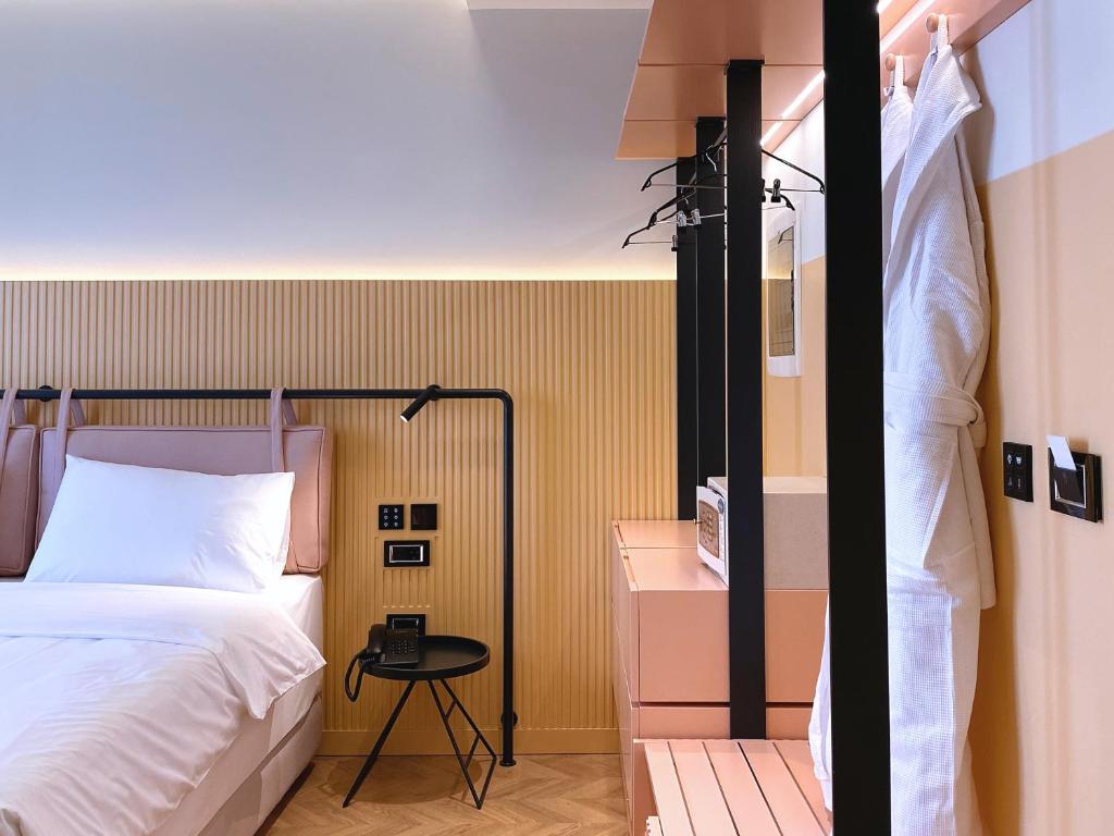 Postel nebo postele na pokoji v ubytování Iliria Boutique Hotel