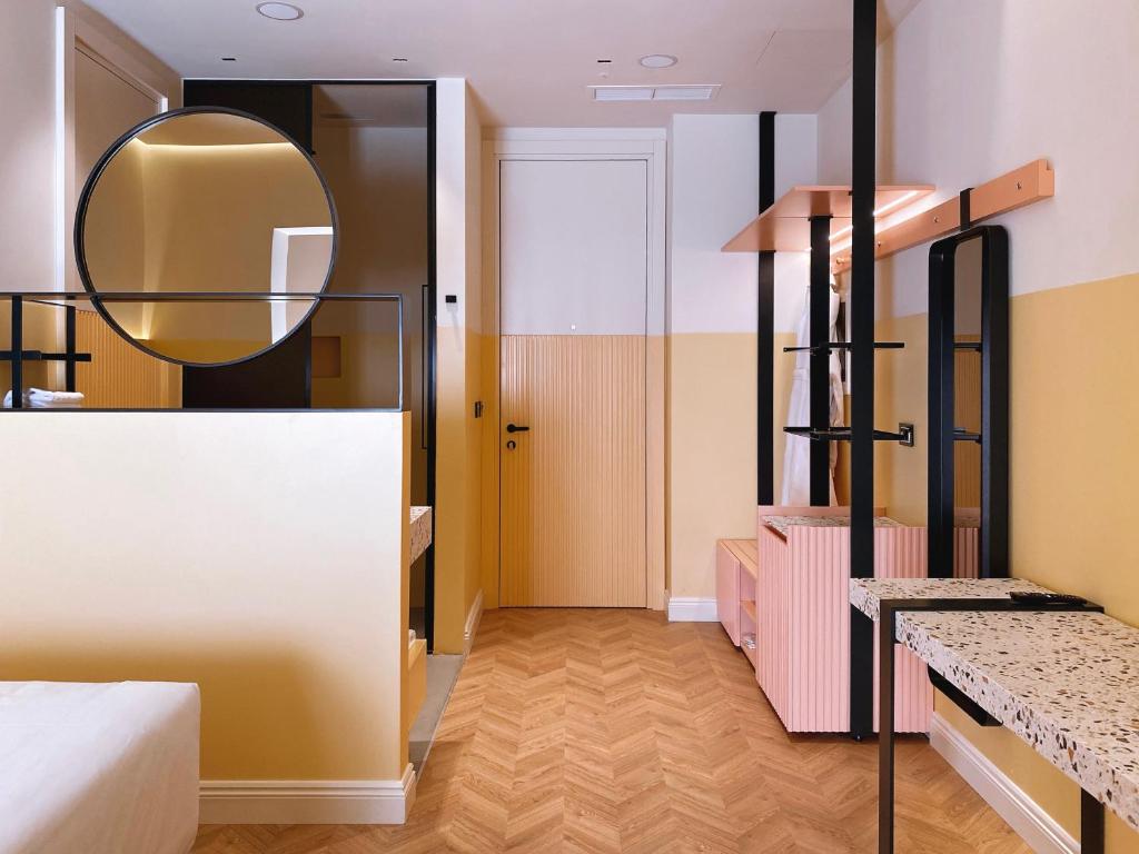 Postel nebo postele na pokoji v ubytování Iliria Boutique Hotel