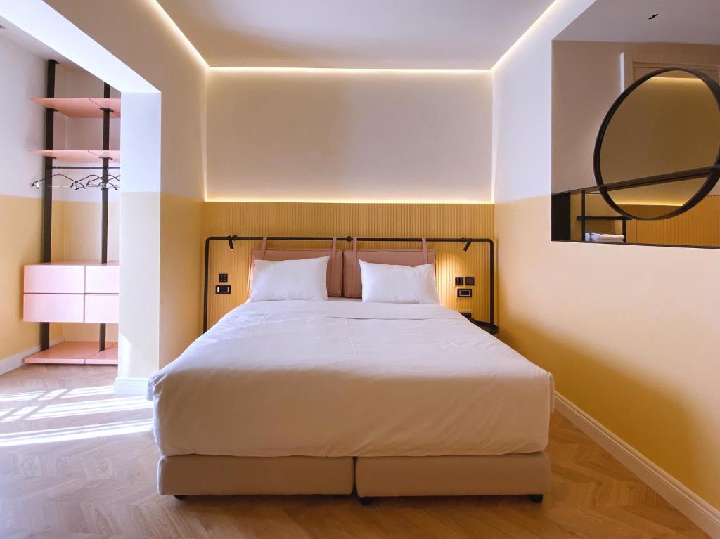 Postel nebo postele na pokoji v ubytování Iliria Boutique Hotel