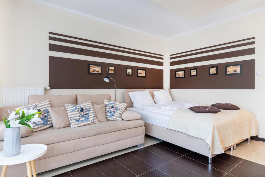 Posteľ alebo postele v izbe v ubytovaní Apartamenty Villa Marea Misdroy by Noclegi Renters