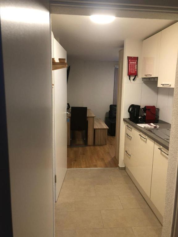 Kuchyň nebo kuchyňský kout v ubytování Haus Astoria