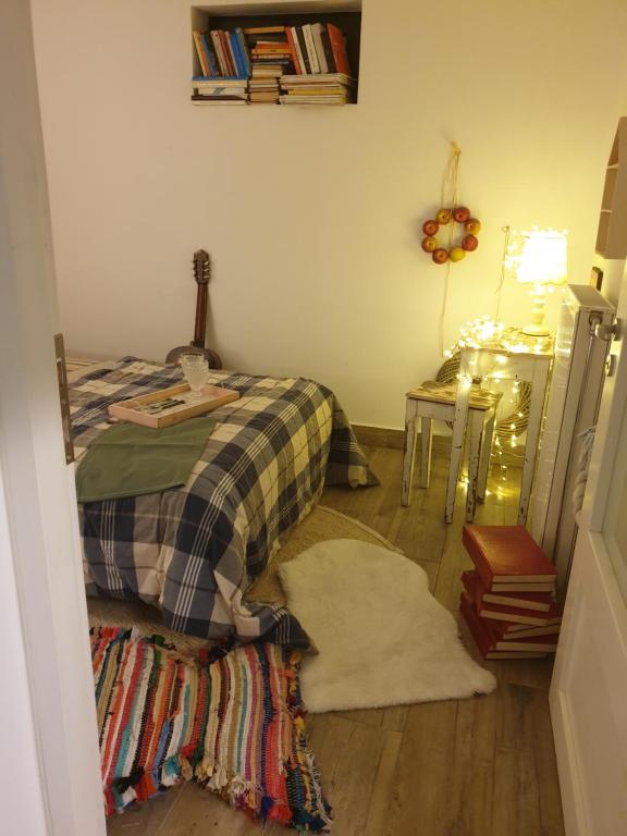 Postel nebo postele na pokoji v ubytování Arismari