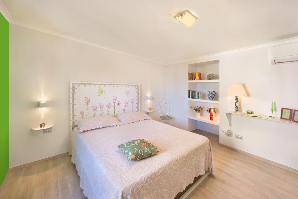 Łóżko lub łóżka w pokoju w obiekcie YourHome - Karme House