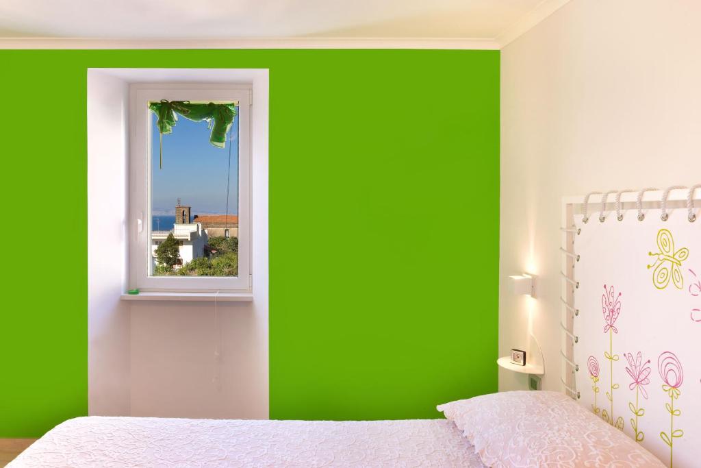 Łóżko lub łóżka w pokoju w obiekcie YourHome - Karme House