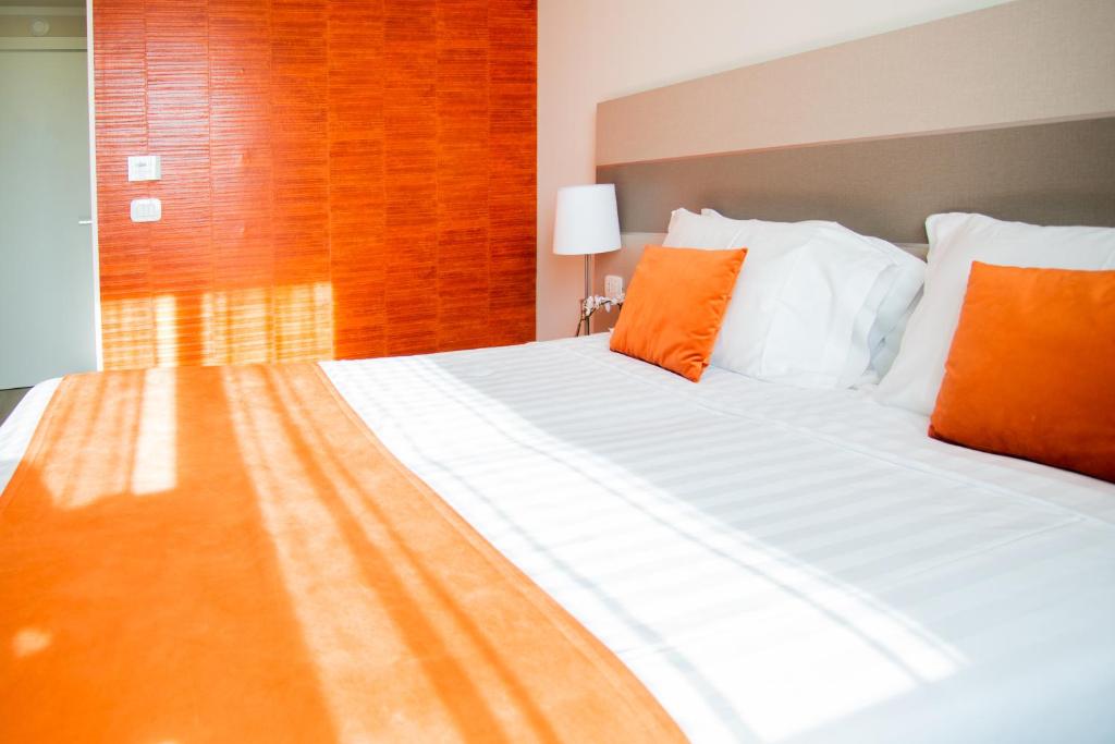 Postel nebo postele na pokoji v ubytování Hotel Glis