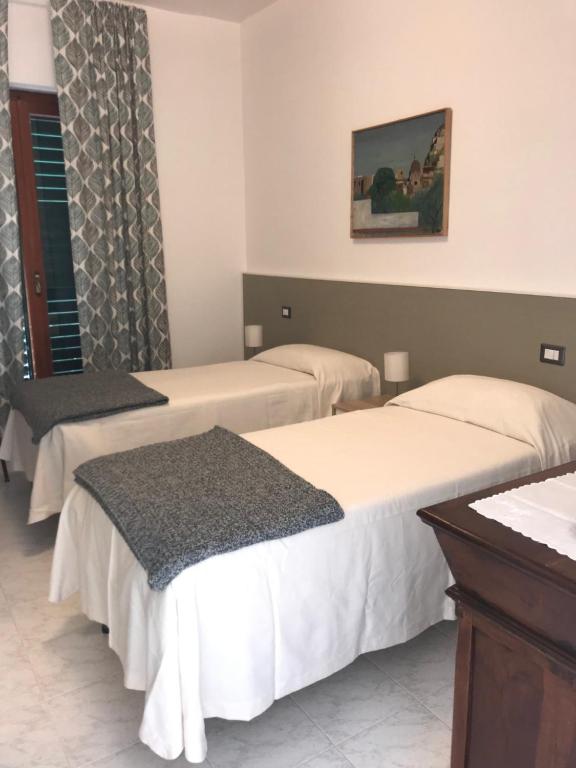 Postel nebo postele na pokoji v ubytování La Casa in Vigna