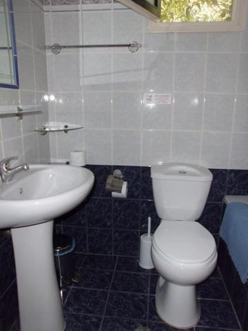 Koupelna v ubytování Conelli Haus