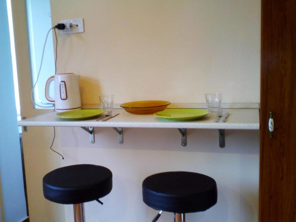 Kuchyň nebo kuchyňský kout v ubytování Bauhaus Astoria Hostel