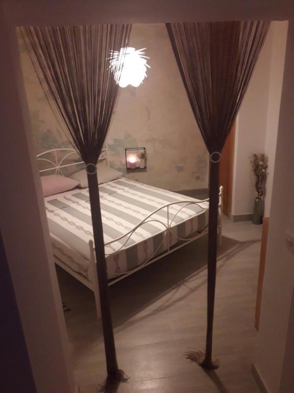 Posteľ alebo postele v izbe v ubytovaní Zorić Apartments & Rooms