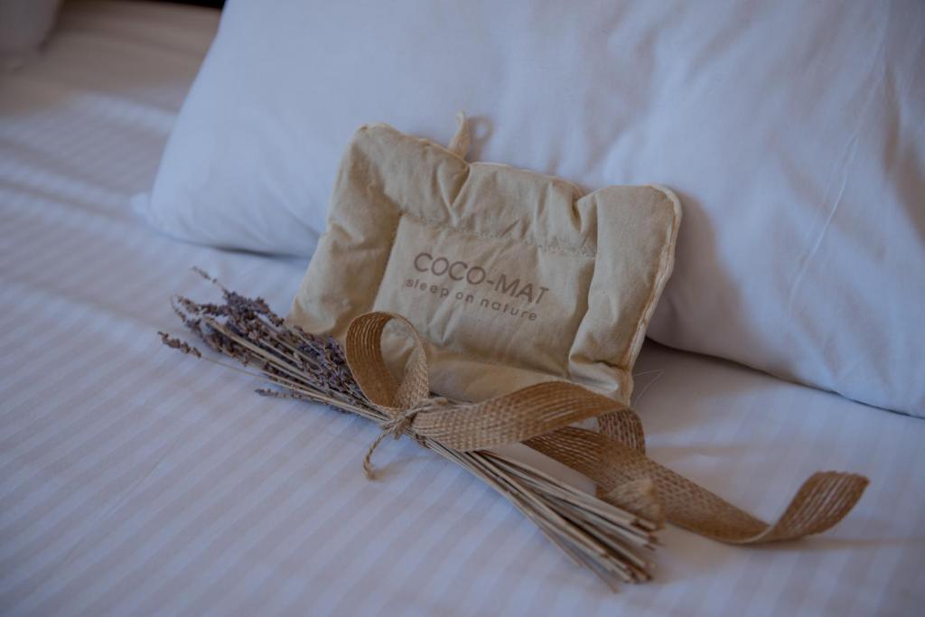 Postel nebo postele na pokoji v ubytování Hotel Palmyra